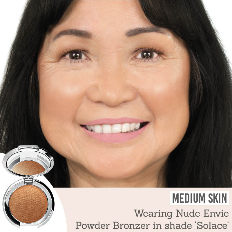 Nude Envie Powder Bronzer in Solace on medium skin